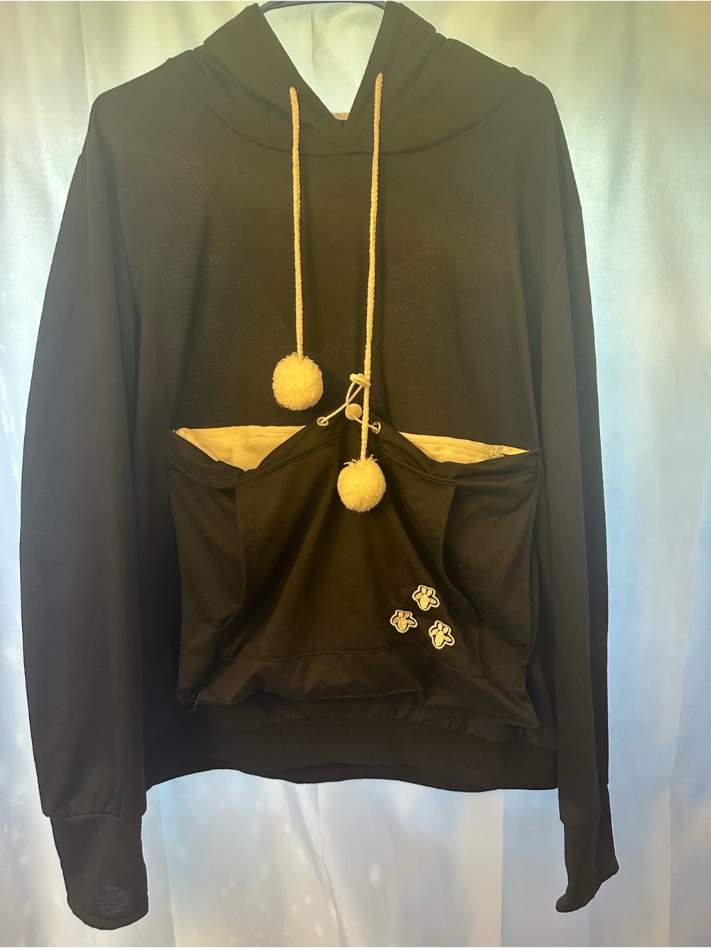 Pet friendly black hoodie with pouch at cat aesthetics!